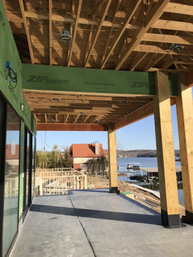 Construction crew working on a residential frame